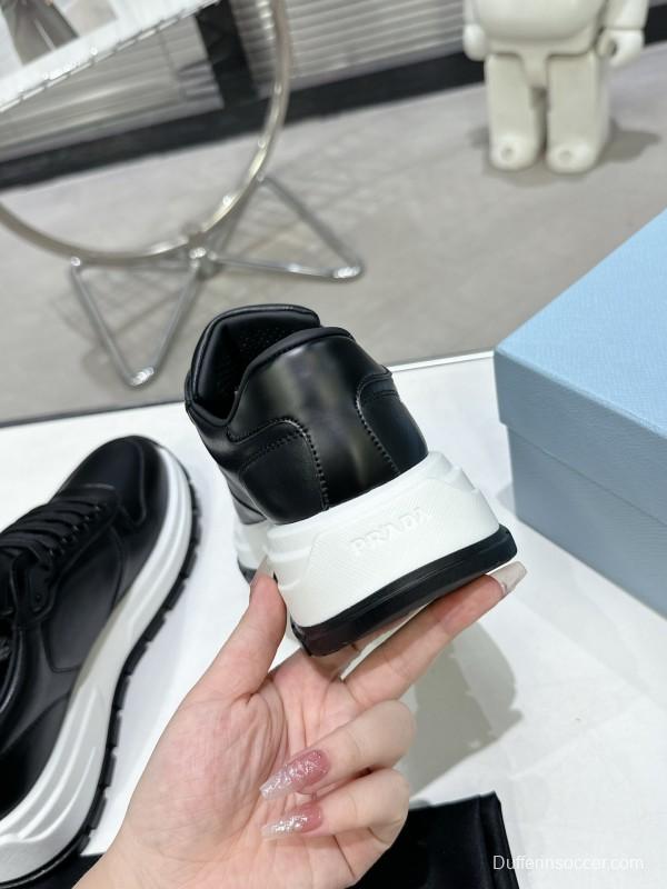 2025 Unisex Prada Black Leather Sneakers KFY00310